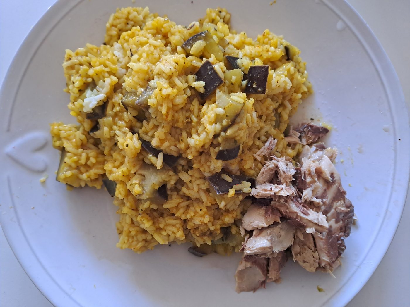 Turmeric rice with aubergine and sardines