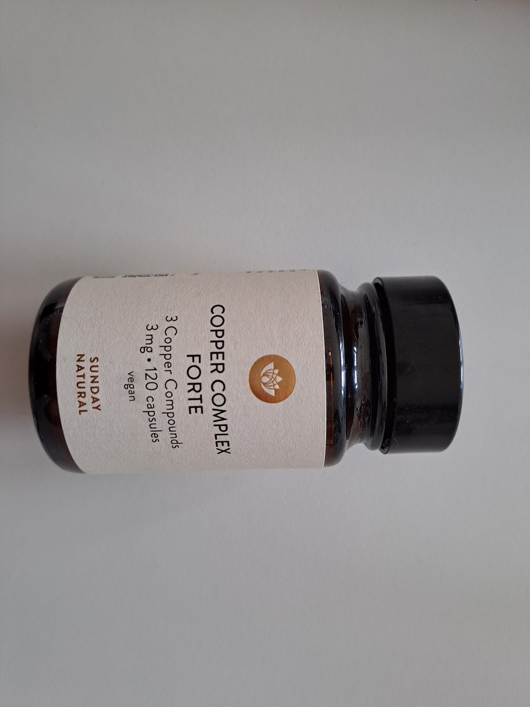 A bottle of Sunday Natural Copper Complex Forte capsules