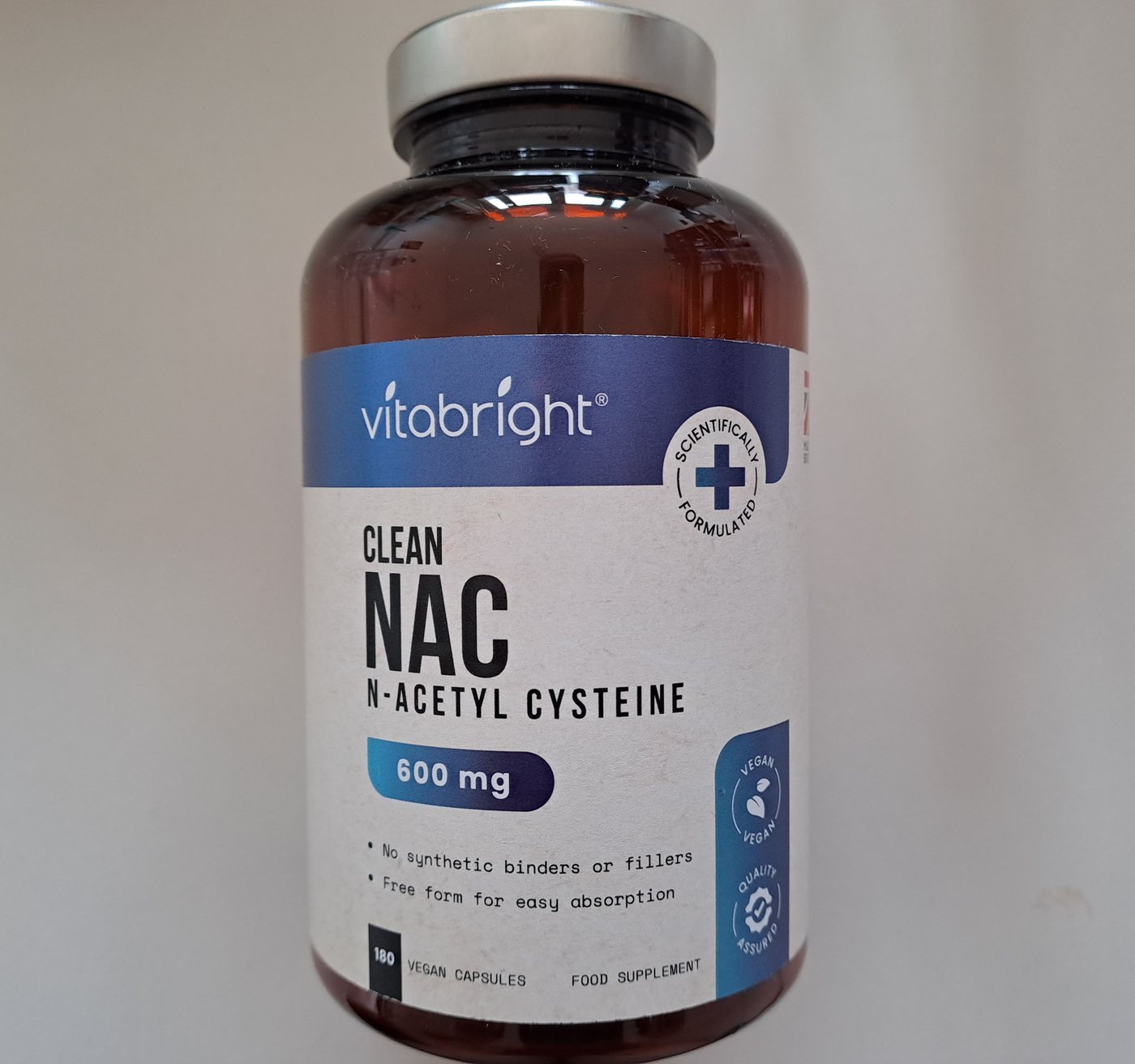 A brown glass bottle of Vitabright Clean NAC, 600mg N-acetyl cysteine, 180 vegan capsules