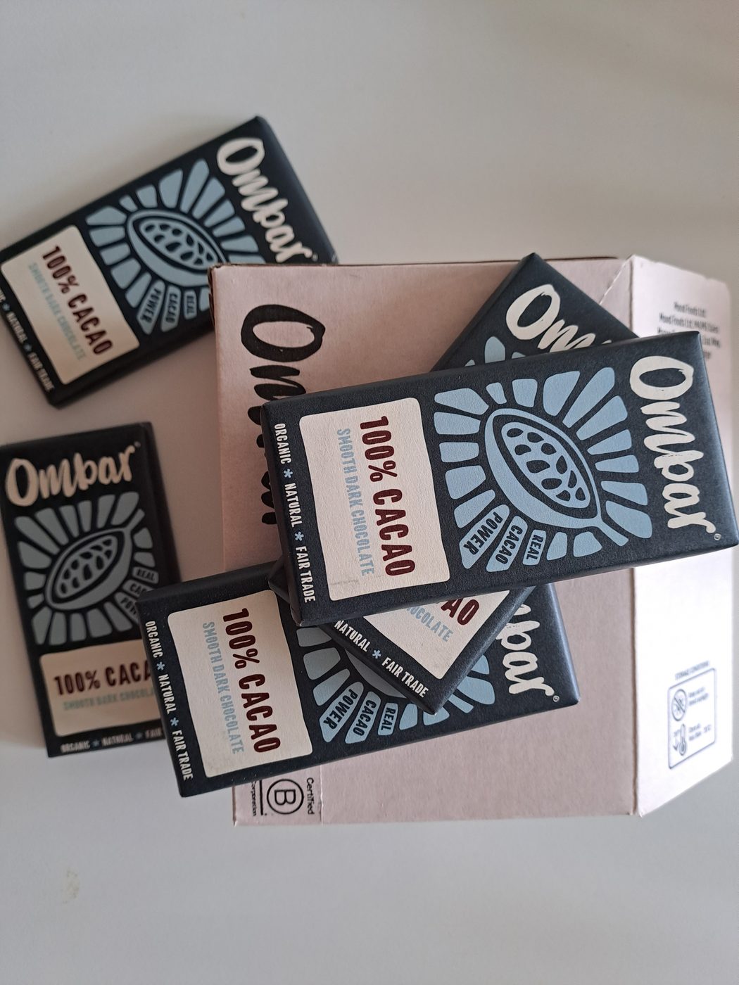 A box of Ombar 100% cacao bars