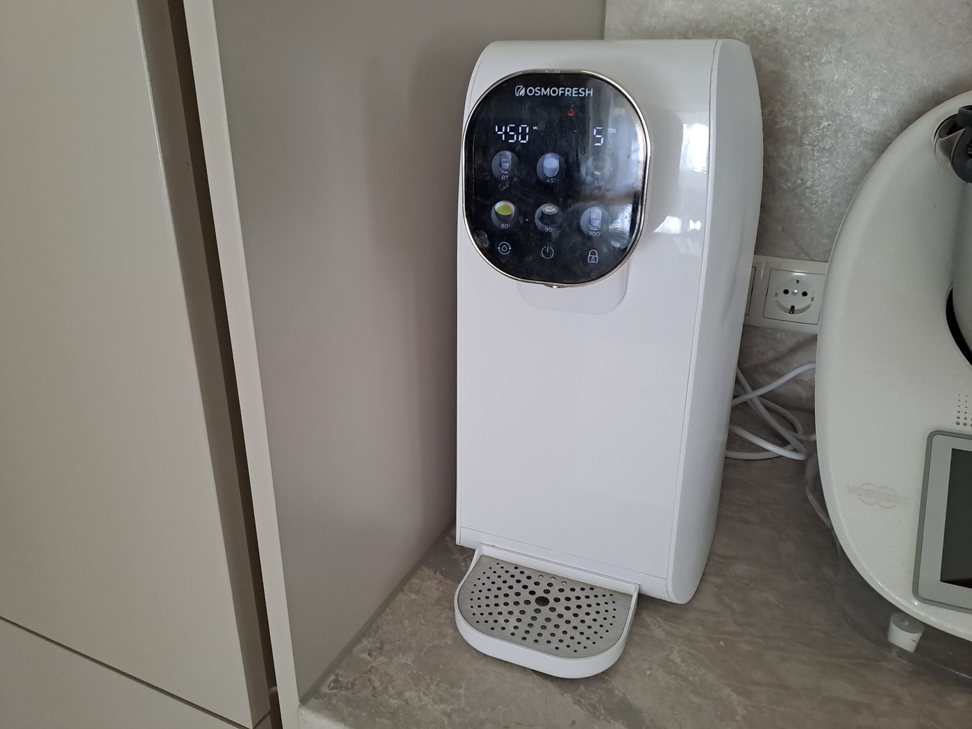 Osmofresh reverse osmosis water dispenser on a kitchen counter