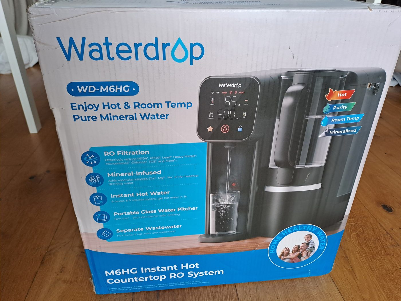 The Waterdrop countertop reverse osmosis system in its box